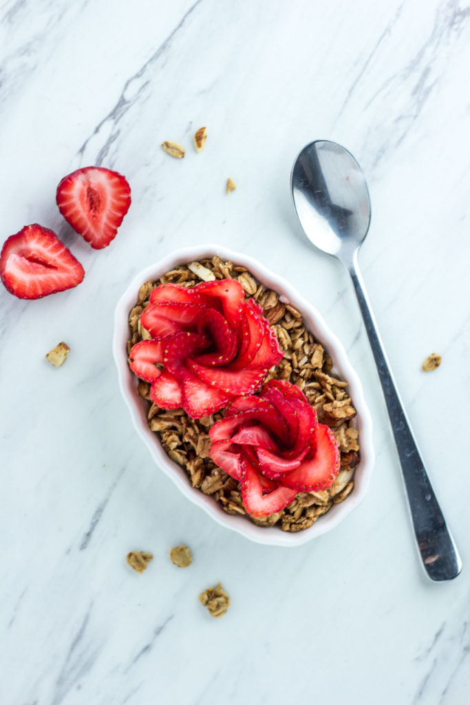 Strawberry rose yogurt bowl with homemade vegan vanilla granola
