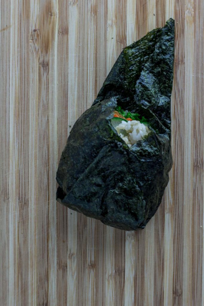 vegan onigirazu - wrapping step 3