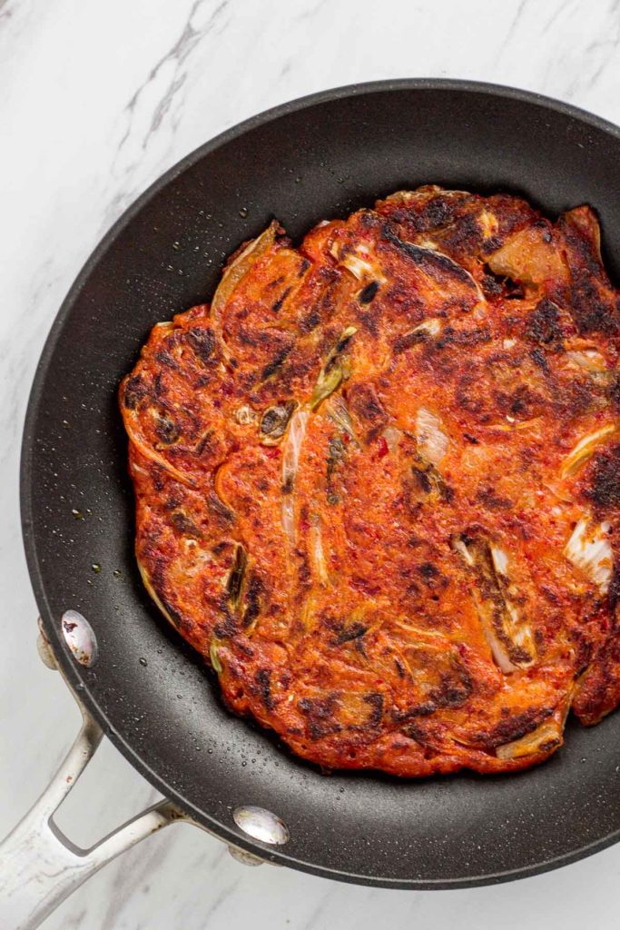 Vegan Korean kimchi pancake in the pan