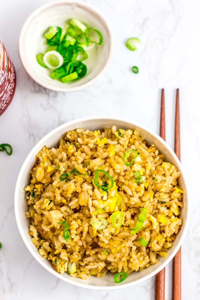 a bowl full of super easy 5 ingredients egg fried rice