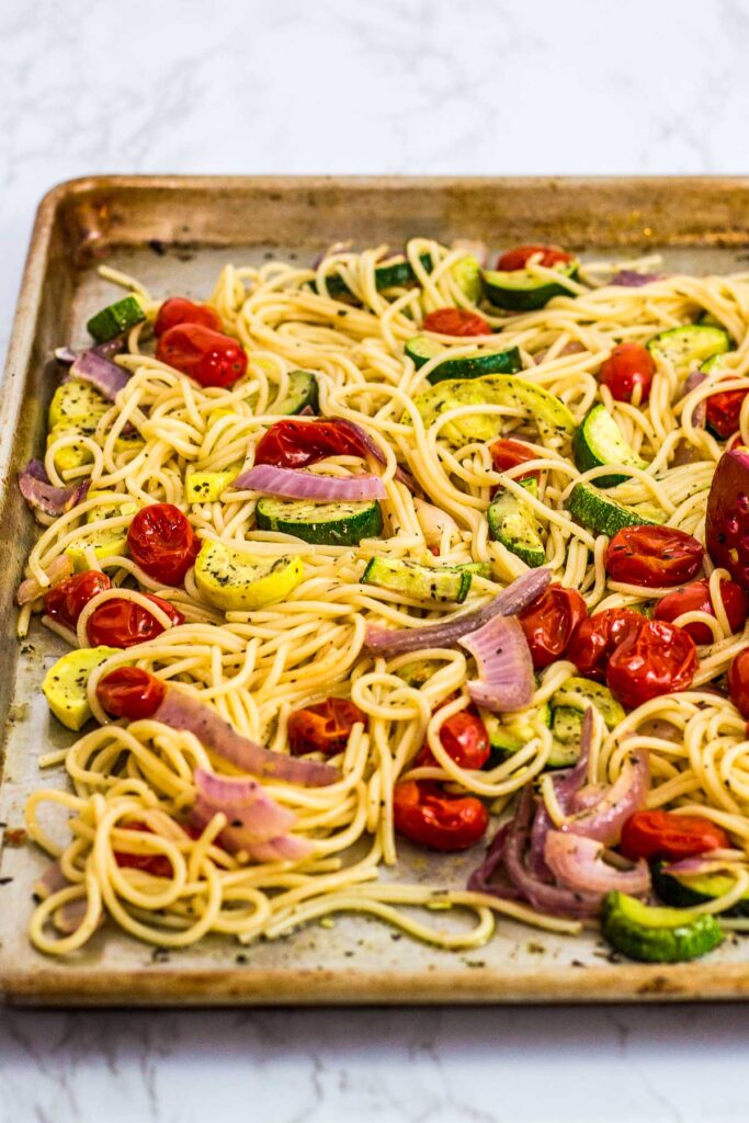 sheet pan full of oven roasted summer veggies and pasta