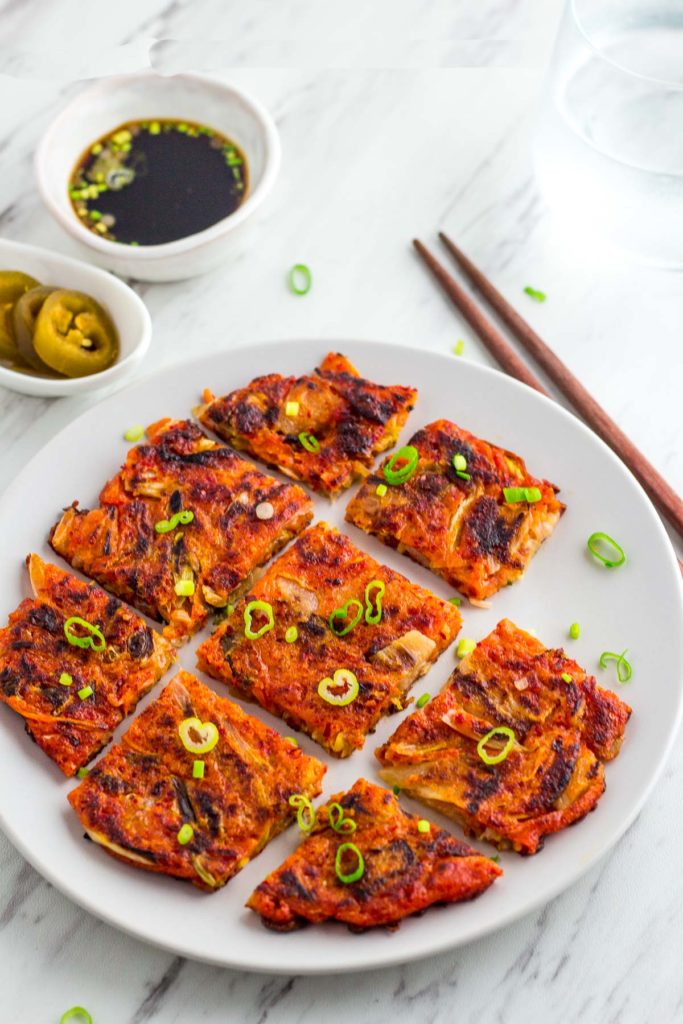 Vegan Korean kimchi pancake, dipping sauce and jalapeño