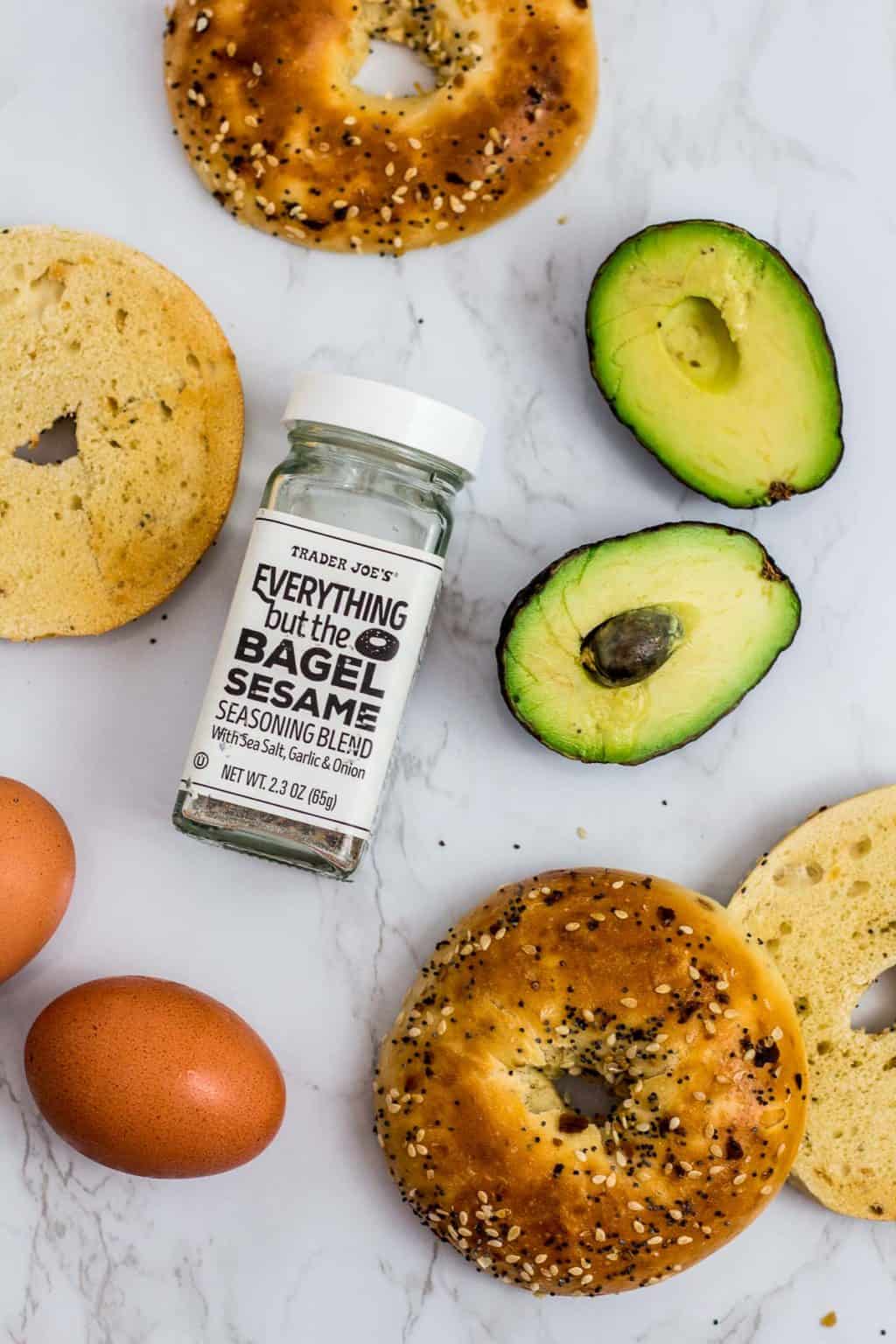 Avocado bagel breakfast sandwich with fried egg My Eclectic Bites