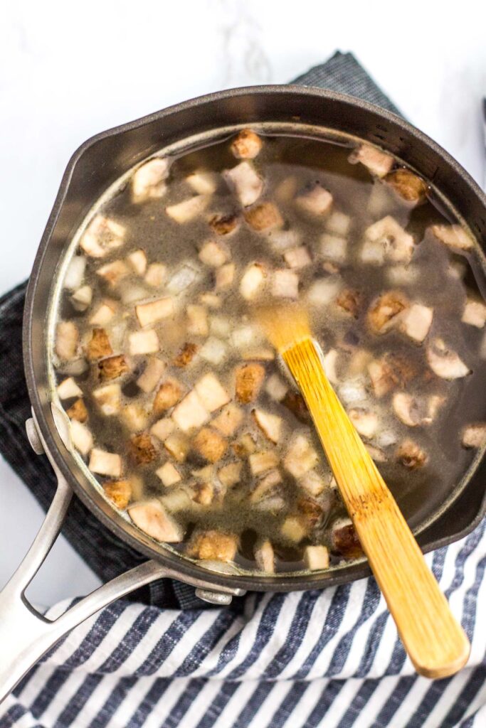 in the process of boiling savory vegan oatmeal