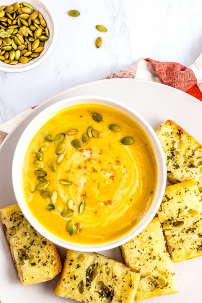 creamy butternut squash soup with garlic bread