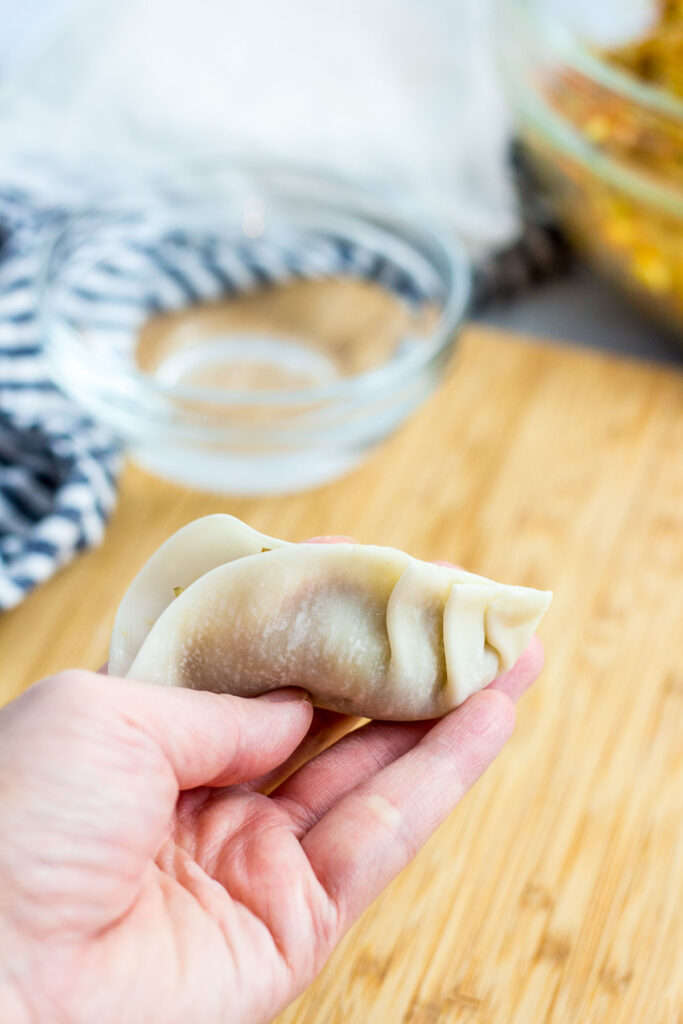 Right side of the mandu/dumpling is folded towards the center