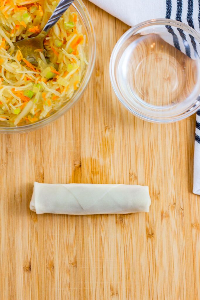 How to fold spring roll - step 8