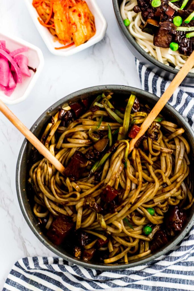 overhead shot of mixed Korean black noodle (Jjajangmyeon)