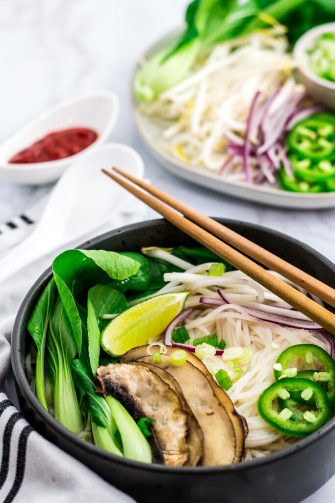 A close up shot of vegan pho with mushrooms