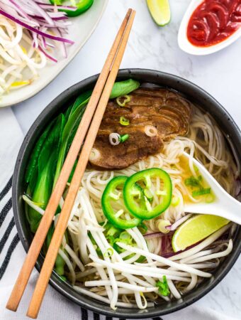 overhead shot of vegan pho with seitan slices