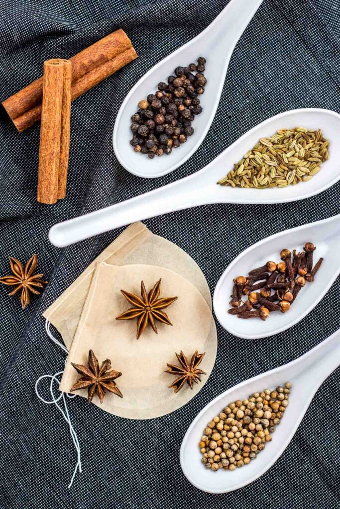 Warming spices - cinnamon, black pepper corns, fennel seeds, cloves, coriander seeds, and star anise