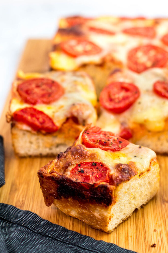 A piece of vegetarian Detroit-style pizza