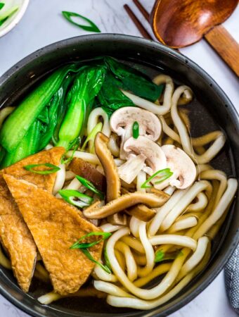 Close up shot of vegan udon noodle soup