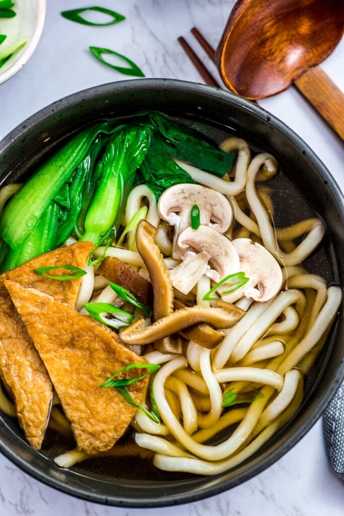 Close up shot of vegan udon noodle soup