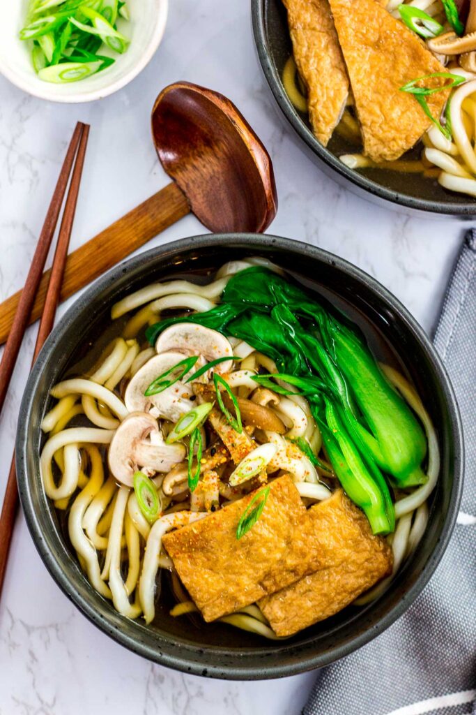 overhead shot of vegan udon noodle soup