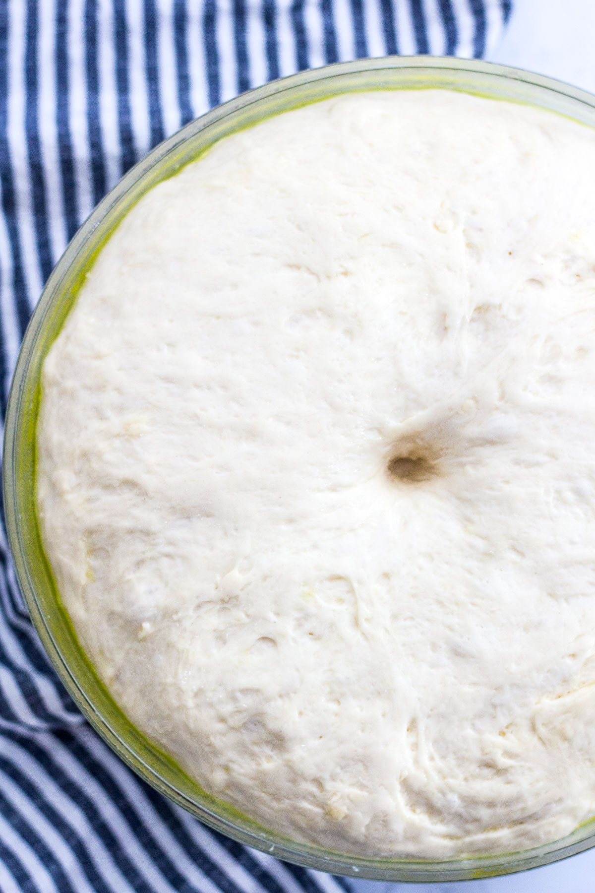 indentation made with index finger remain on dough after fully risen