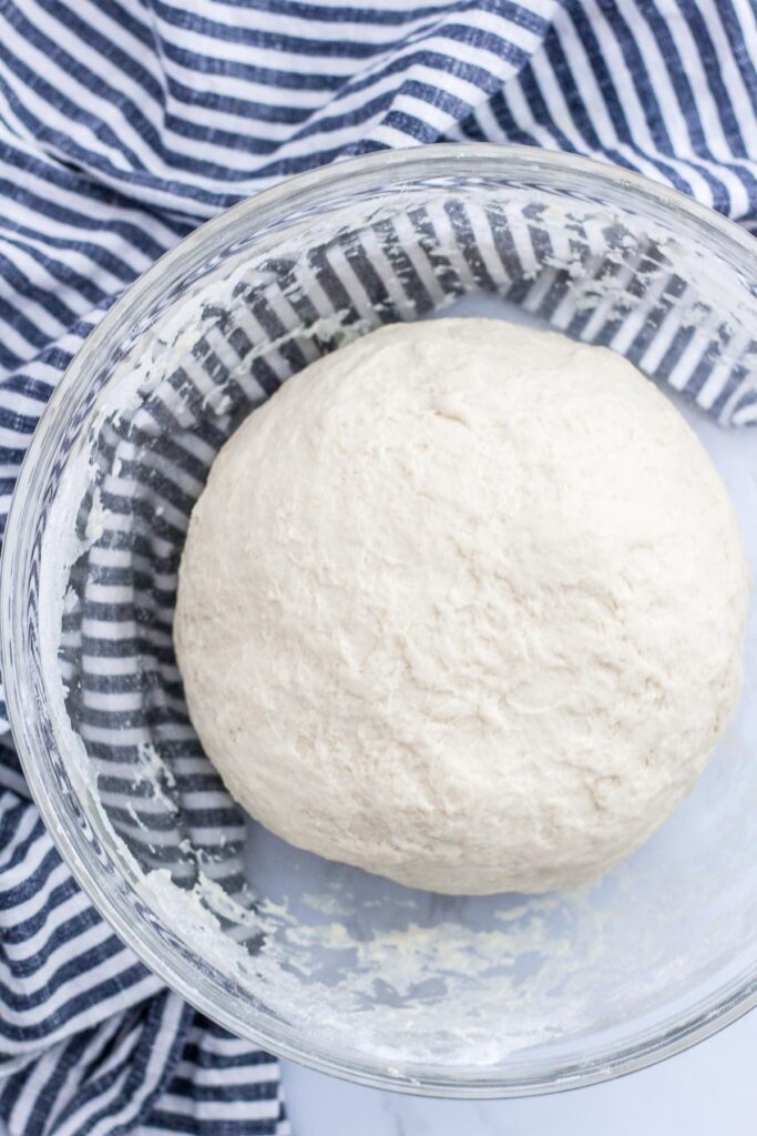 pizza dough kneaded by hand, before rising