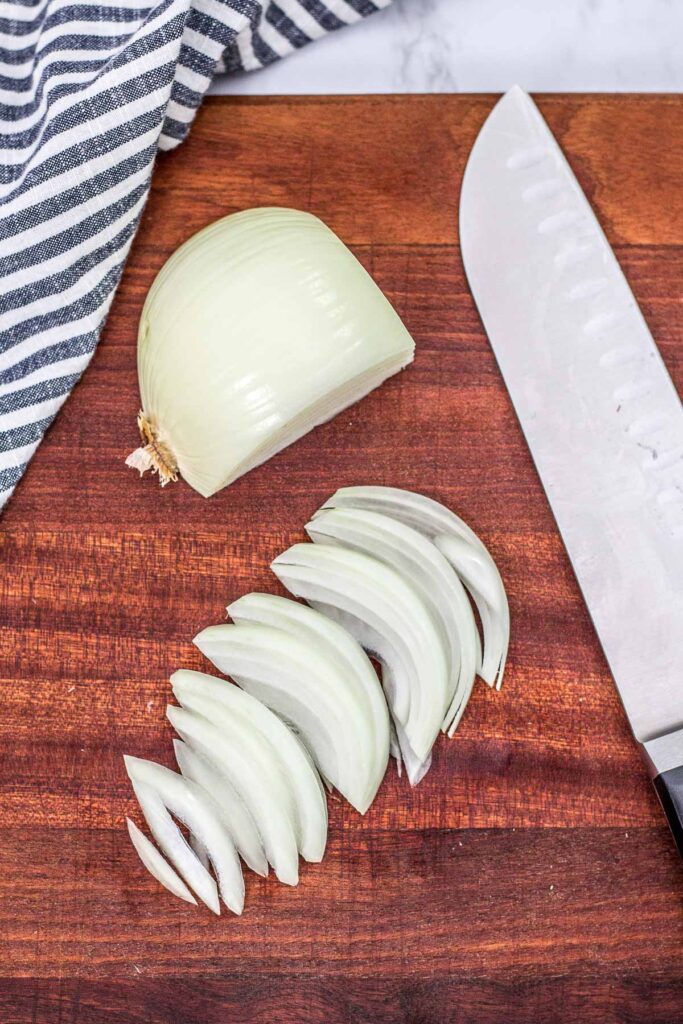 very thinly sliced onion ready to be minced