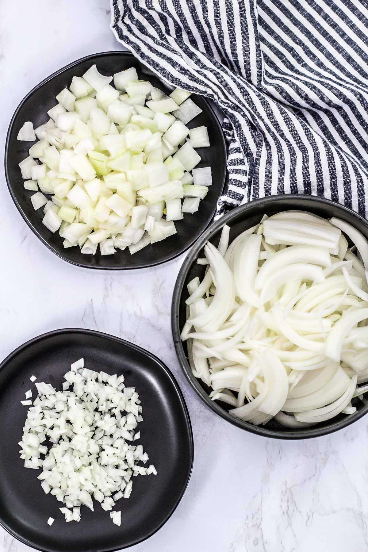 diced onion on top, sliced onion in the middle, and minced onion on the bottom