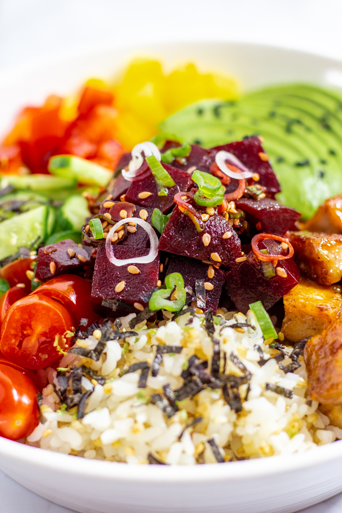 close up photo of vegan marinated beet poke bowl