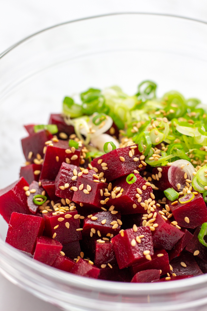 diced beets, green onion, and sesame seeds in a bowl