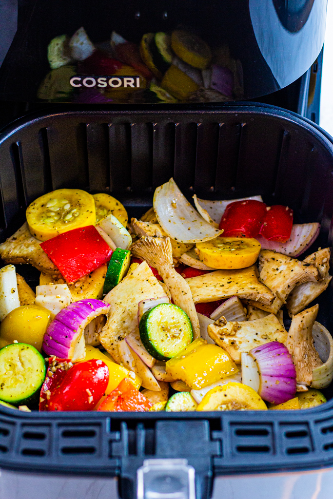 close up photos of vegetables in Cosori air fryer basket