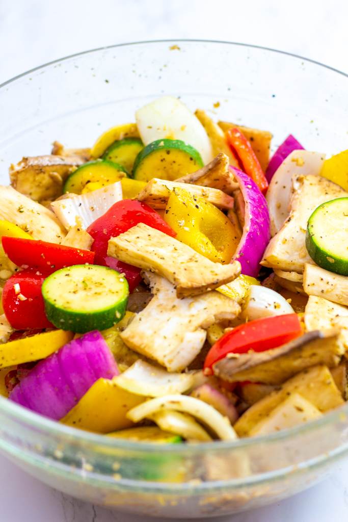 marinated vegetables in a large clear bowl