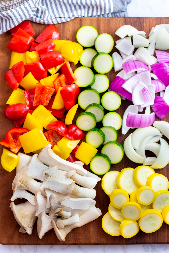 cut vegetables on a wooden board before marinade