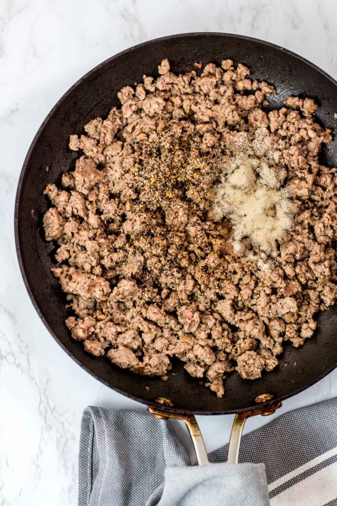 cooked impossible meat with seasoning in the pan