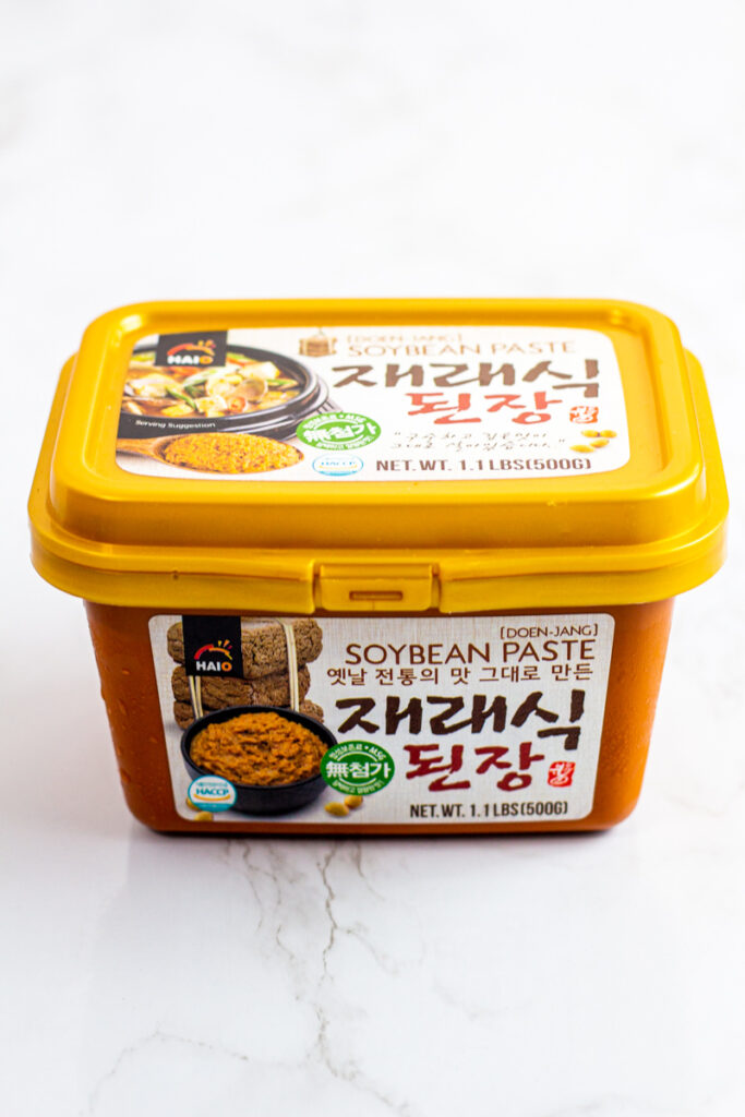 photo of a store-bought doenjang (soybean paste).