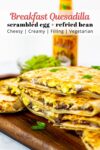 breakfast quesadilla with scrambled egg and refried black bean.