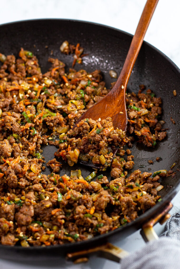 cooked vegan bulgogi grounds made with impossible meat in the pan.