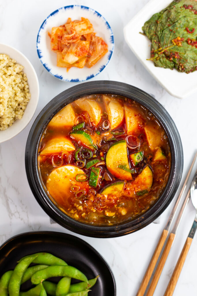 other side dishes are around vegan soondubu jjigae.