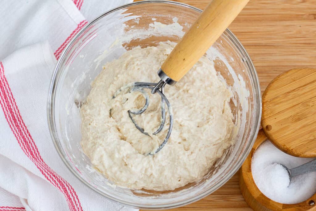 Sticky sourdough discard focaccia dough after mixing flour, yeast, and salt