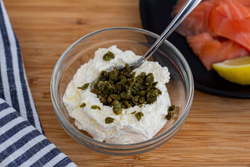 Whipped cream cheese mixed with minced capers for smoked salmon flatbread.