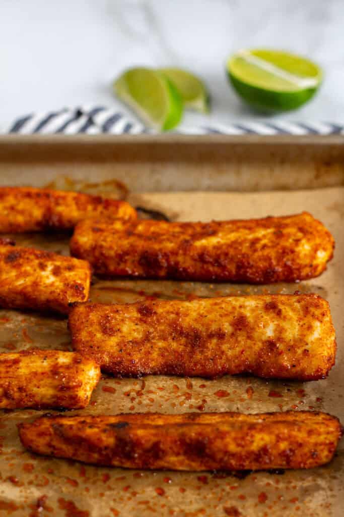Cooked blackened mahi mahi fillets with a lightly crisp exterior.