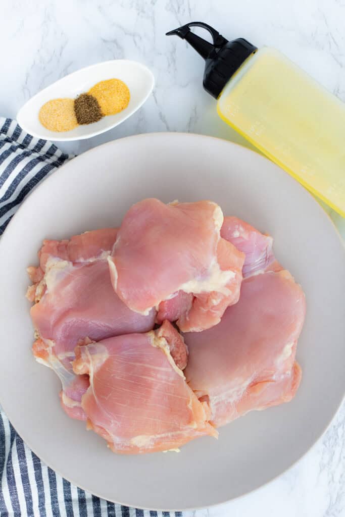 boneless skinless chicken thighs with garlic powder onion powder black pepper and oil for air fryer teriyaki chicken