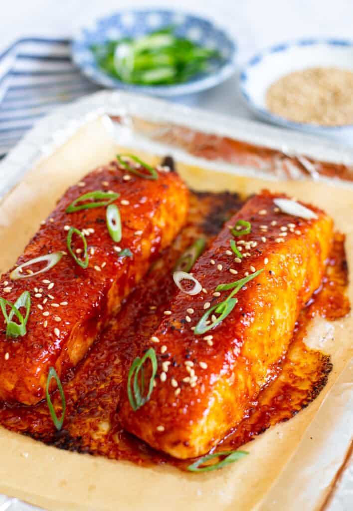 salmon fillets coated in gochujang glaze baked until glossy and caramelized
