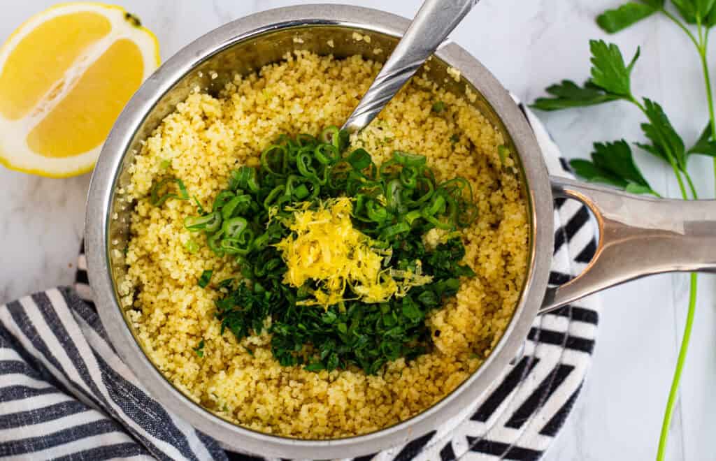 Fluffy couscous mixed with chopped herbs and lemon zest