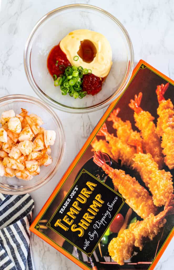 box of tempura shrimp with cooked shrimp and sauce for shrimp poke bowl