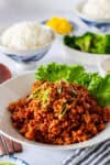 Gochujang ground pork served with lettuce leaves and steamed rice.