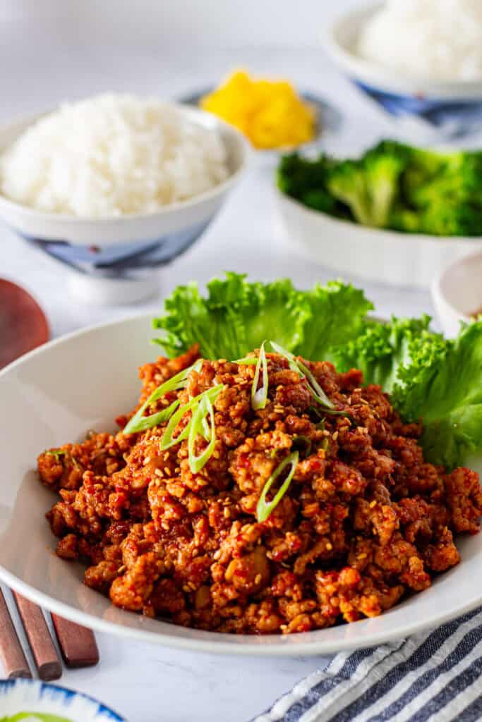 Gochujang ground pork served with lettuce leaves and steamed rice.
