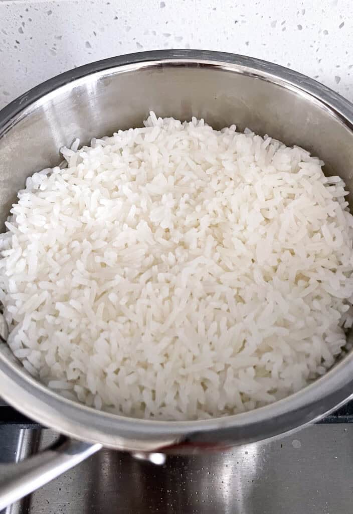 Cooked jasmine rice in a saucepan after the water has been absorbed