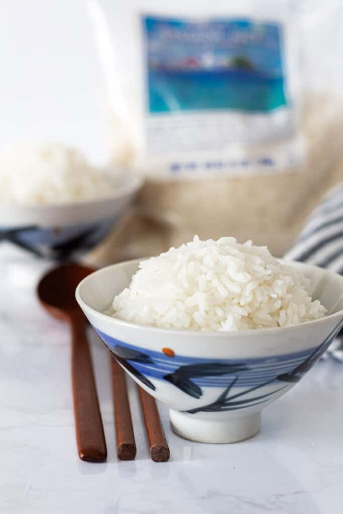 Fluffy homemade jasmine rice served in a small bowl