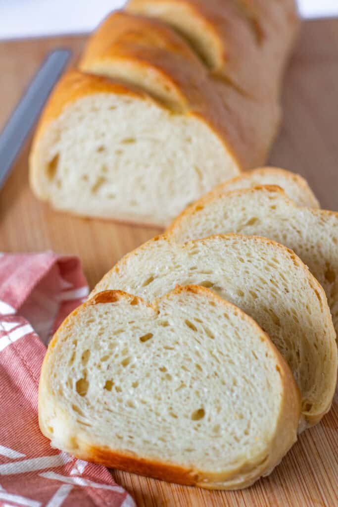 Close-up of sliced sourdough discard French bread showing the soft interior crumb.