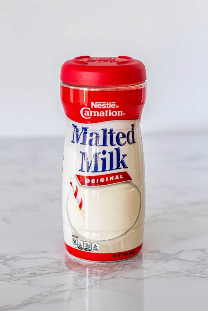 Container of Carnation original malted milk powder